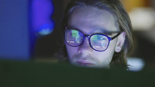 man staring at code